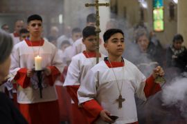 Palestinian Christians attend a Mass at the Holy Family Church after the death of Pope Francis was announced by the Vatican, in Gaza City, April 21, 2025. REUTERS/Dawoud Abu Alkas