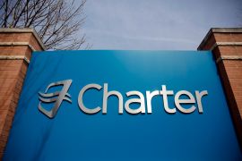 Signage at an entrance to Charter Communications' headquarters.