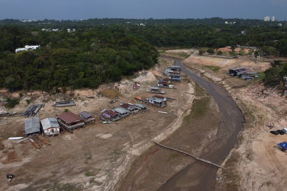 The Taruma Acu River is visible amid a severe drought in Manaus, state of Amazonas, Brazil, Wednesday, September 25, 2024 [File: Edmar Barros/AP Photo]