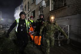 Police carry an injured man on a stretcher after a Russian strike on residential neighbourhood in Zaporizhzhia, Ukraine, on Thursday, May 1, 2025 [Kateryna Klochko/AP]